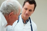 doctor speaking to a senior patient