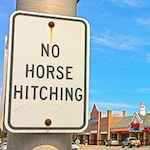 "no horse hitching" sign