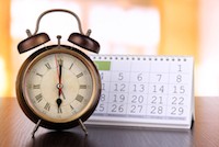 clock and calendar on counter top