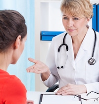 doctor talking to patient