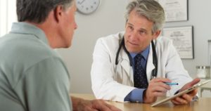 doctor talking with patient