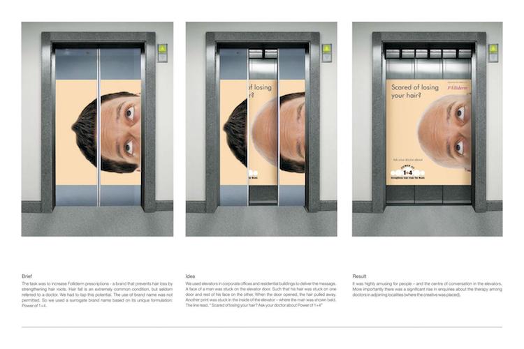 elevator door ads promoting male baldness restoration