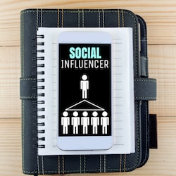 journal with cover reading "social influencer"